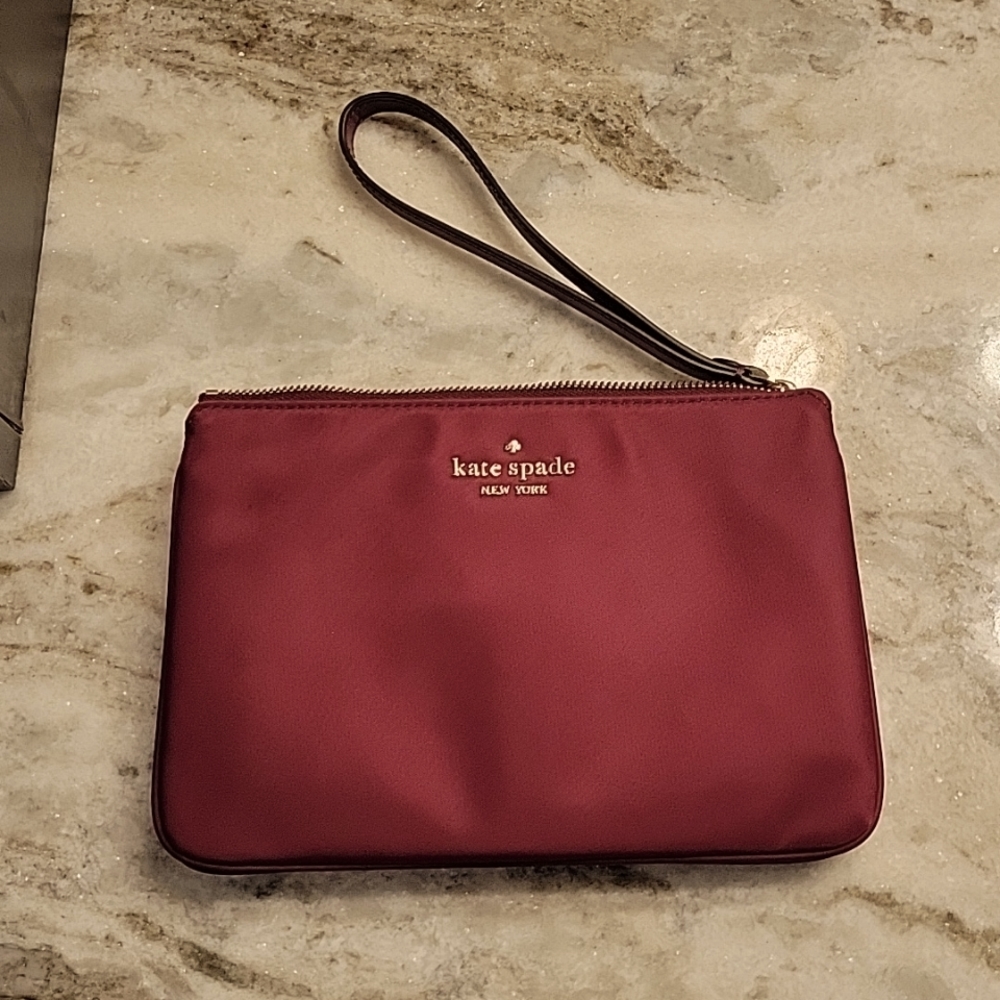 Kate Spade New York Burgundy Color Wristlet  Size 8 x5 1/2